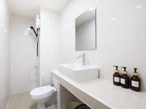 Et badeværelse på 3 Beds,WiFi,Washing Machine,IMPACT Arena at T9