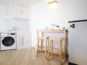 Køkken eller tekøkken på 3 Beds,WiFi,Washing Machine,IMPACT Arena at T9