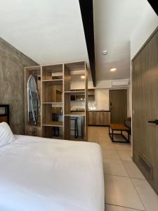 Ένα ή περισσότερα κρεβάτια σε δωμάτιο στο Rau Departamentos +61 φωτογραφίες