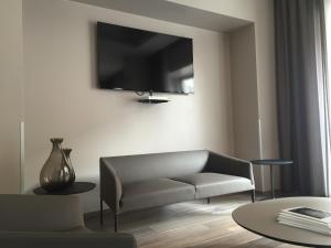 TV o dispositivi per l'intrattenimento presso Mokinba Hotels Baviera