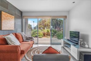 Μια τηλεόραση ή/και κέντρο ψυχαγωγίας στο Morze Beachfront, Currarong