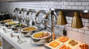 a buffet with many dishes of food on a table at Echarm Hotel Shenzhen International Exhibition Center Fuyong in Fenghuangwei