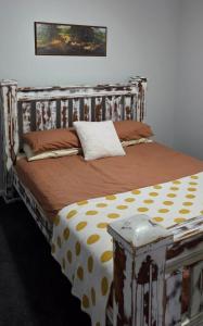 Un pat sau paturi într-o cameră la Warrumyea Country Stay