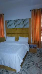 Postel nebo postele na pokoji v ubytování Precious Service Apartment Home