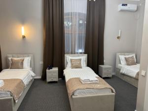 Postel nebo postele na pokoji v ubytování Prima Villa Boutique Hotel отель