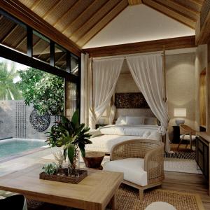 a bedroom with a bed and a table and a couch at The One Boutique Villa in Seminyak +101 photos