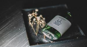 a bottle of wine sitting on top of a table at SLEEEP HKG Causeway Bay in Hong Kong