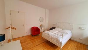 Ένα ή περισσότερα κρεβάτια σε δωμάτιο στο Zimmer im Erdgeschoss