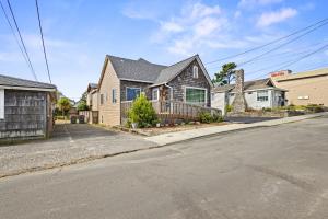 a house on the side of a street at Seaside Getaway B in Seaside