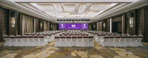 Zona de afaceri și/sau sala de conferințe de la Excemon Yuyao Hemudu Hotel