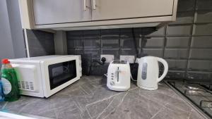 Kuchyň nebo kuchyňský kout v ubytování Nice Living Serviced Accommodations Birmingham 2 + 14 fotografií