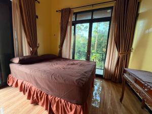 Ένα ή περισσότερα κρεβάτια σε δωμάτιο στο Kreo Guest House