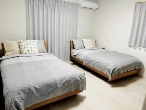 Postel nebo postele na pokoji v ubytování 馥の森 + 11 fotografií