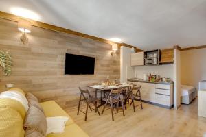 Η κουζίνα ή μικρή κουζίνα στο Abeti Ski Apartments