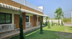 Κήπος έξω από το Charming Home Resort