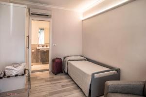 Postel nebo postele na pokoji v ubytování Hotel Villa Giulia