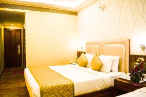 Kamar di Shamrock Greens by Jardin Hotels