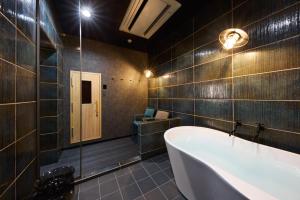 Koupelna v ubytování マイグレ南青山 + 35 fotografií