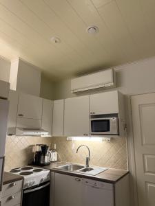 Kuchyň nebo kuchyňský kout v ubytování Rantahiekka B3 + 6 fotografií