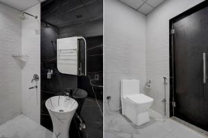 Ένα μπάνιο στο Townhouse Subharti University Meerut Formerly Hotel Celebration