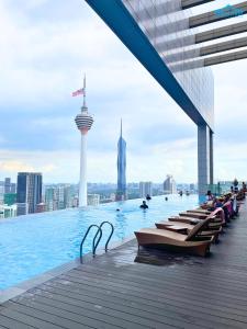 a swimming pool on the top of a building at Platinum Suites KLCC by Dream'Inn in Kuala Lumpur
