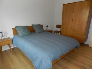 Ένα ή περισσότερα κρεβάτια σε δωμάτιο στο Gite Le Koto