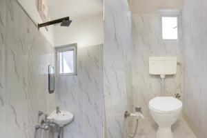 Ένα μπάνιο στο Super Collection O Chhapra Railway Junction Formerly Hotel City Palace