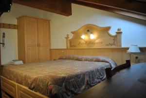 Voodi või voodid majutusasutuse Hotel Niagara toas