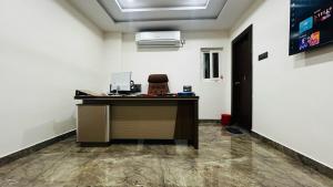 Afbeelding uit fotogalerij van Townhouse Kothagudem Bus Terminal Vijayawada Formerly Rasballa in Kottagūdem