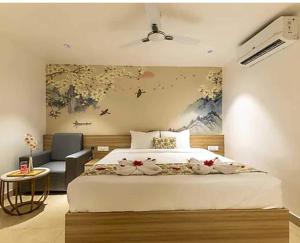 Ένα ή περισσότερα κρεβάτια σε δωμάτιο στο Hotel O Square Mall Hyderabad Formerly A1 Classic