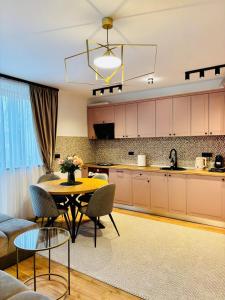 Kuchyň nebo kuchyňský kout v ubytování Cozy Home