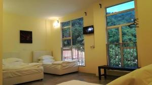 Ένα ή περισσότερα κρεβάτια σε δωμάτιο στο Hotel Pangkor Mutiara +59 φωτογραφίες