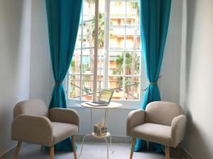 Khu vực ghế ngồi tại Apartments Monaco