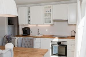 Kuchyň nebo kuchyňský kout v ubytování Appartement Aigner