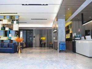 O zonă de relaxare la Echarm Hotel Xiangyang Erqi