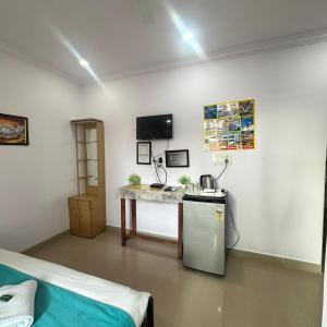 Η κουζίνα ή μικρή κουζίνα στο 2bhk Home Stay Calangute