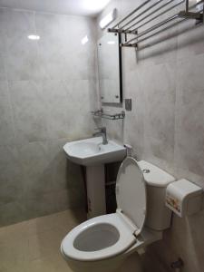 Koupelna v ubytování Best Eastern, Nikunja-2