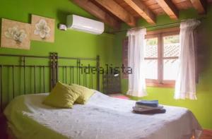 Ένα ή περισσότερα κρεβάτια σε δωμάτιο στο La perla perdida El Acebuchal