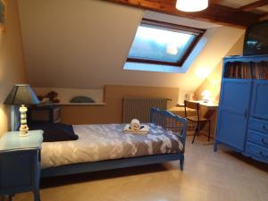 Postel nebo postele na pokoji v ubytování Gîte Fischer