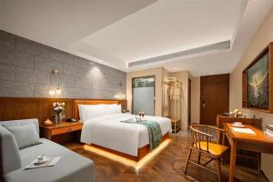 Ένα ή περισσότερα κρεβάτια σε δωμάτιο στο Parkman Hotel Beijing Shunyi Hyundai Motor Center Branch
