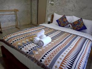 Ένα ή περισσότερα κρεβάτια σε δωμάτιο στο Banna Cafe & Glamping บ้านนา คาเฟ่ แอนด์ แกรมปิ้ง +25 φωτογραφίες