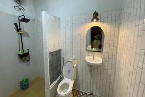 O baie la Capital O 94840 Unihomestay Malioboro Syariah