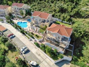 an overhead view of a large house with a pool at Kotor Vista Seaview 2 apartment by MN Property in Muo
