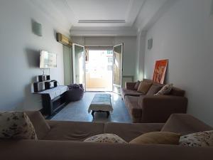 Et opholdsområde på Comfort & Space in Ennasr