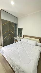 Ένα ή περισσότερα κρεβάτια σε δωμάτιο στο Moses Home