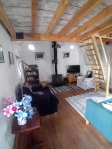 Posezení v ubytování The Barn Square Island + 1 fotografie