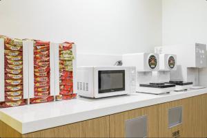 Η κουζίνα ή μικρή κουζίνα στο 호텔 스테이 여유