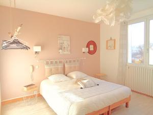 Ένα ή περισσότερα κρεβάτια σε δωμάτιο στο Le Mauzac chambre Zen