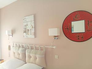 Ένα ή περισσότερα κρεβάτια σε δωμάτιο στο Le Mauzac chambre Zen