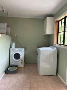 Imagine din galeria proprietății A luxury seaside vacation villa located in a quiet and upscale neighborhood în Auckland